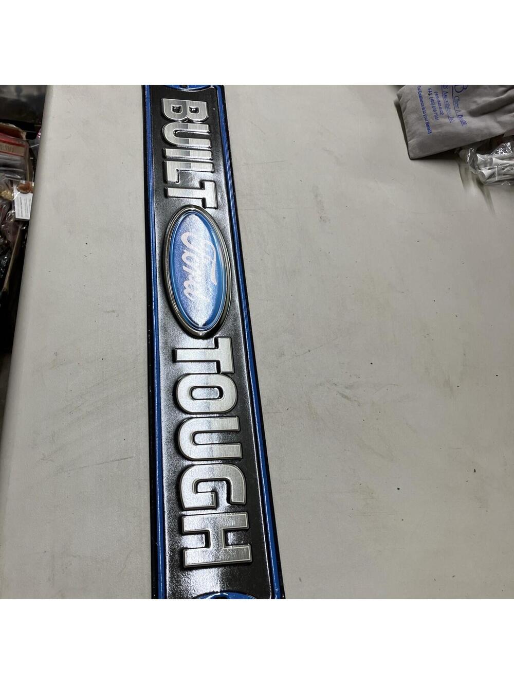 BUILT FORD TOUGH metal sign Open Roads Brands 20"x3 1/4"